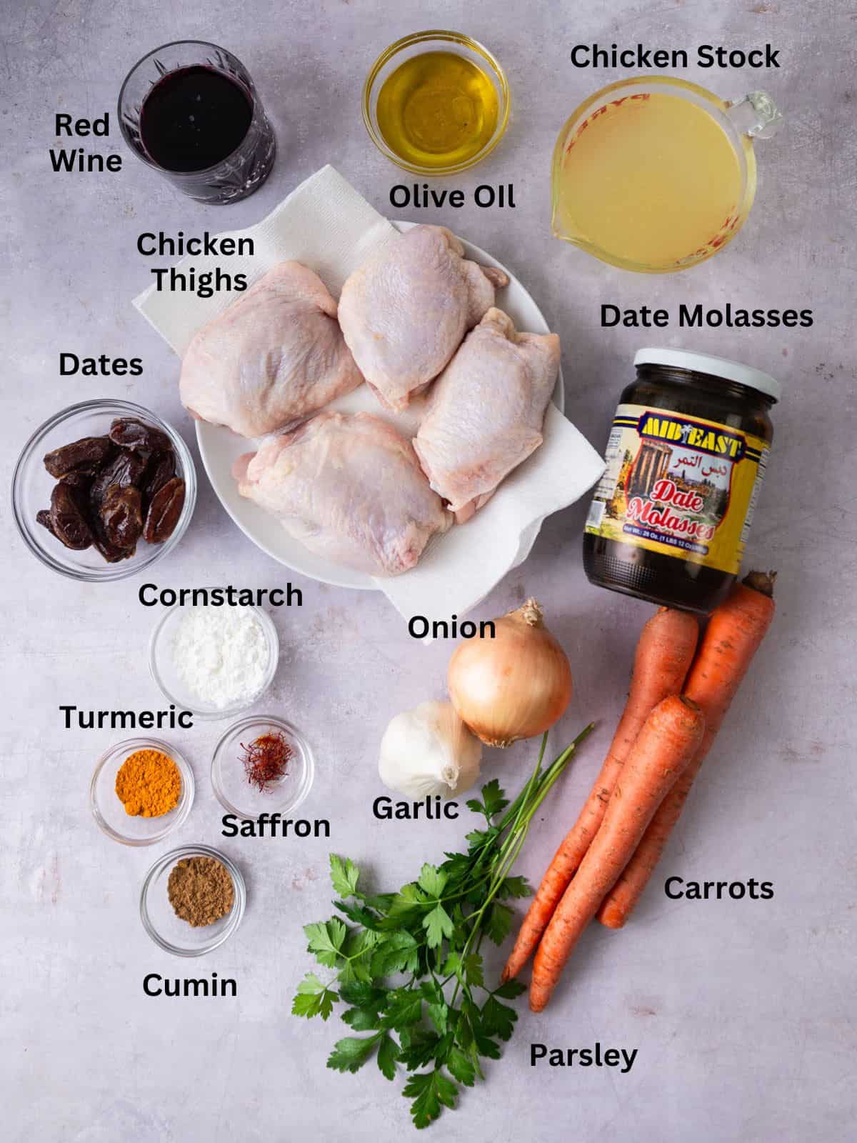 Ingredients for chicken with dates including date molasses, red wine and spices.