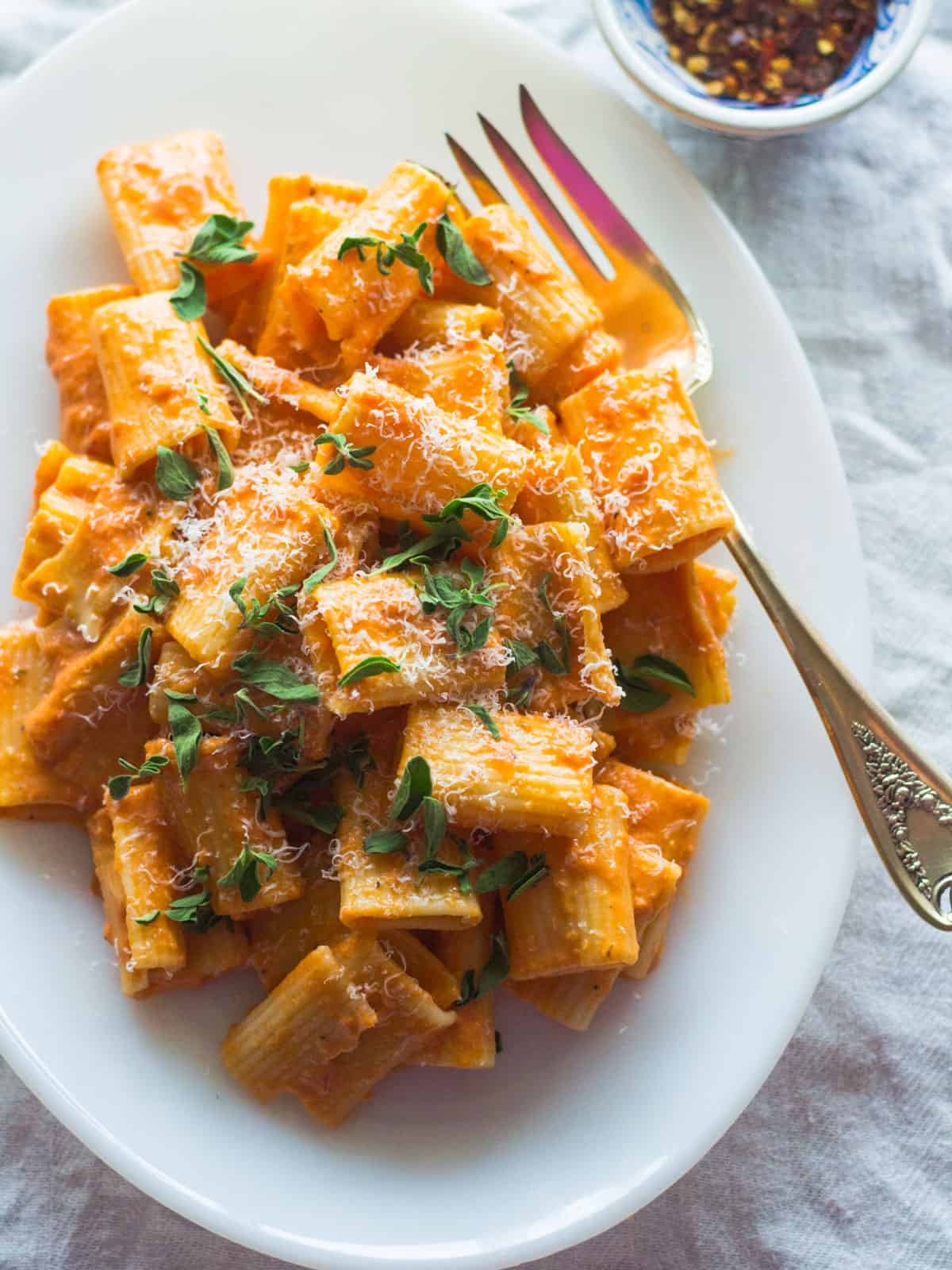 Pink vodka sauce with Parmesan cheese and oregano.