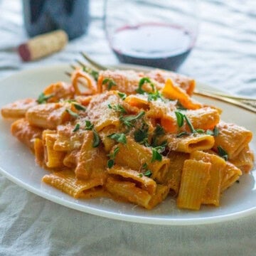 Pink vodka sauce with rigatoni and Parmesan cheese.