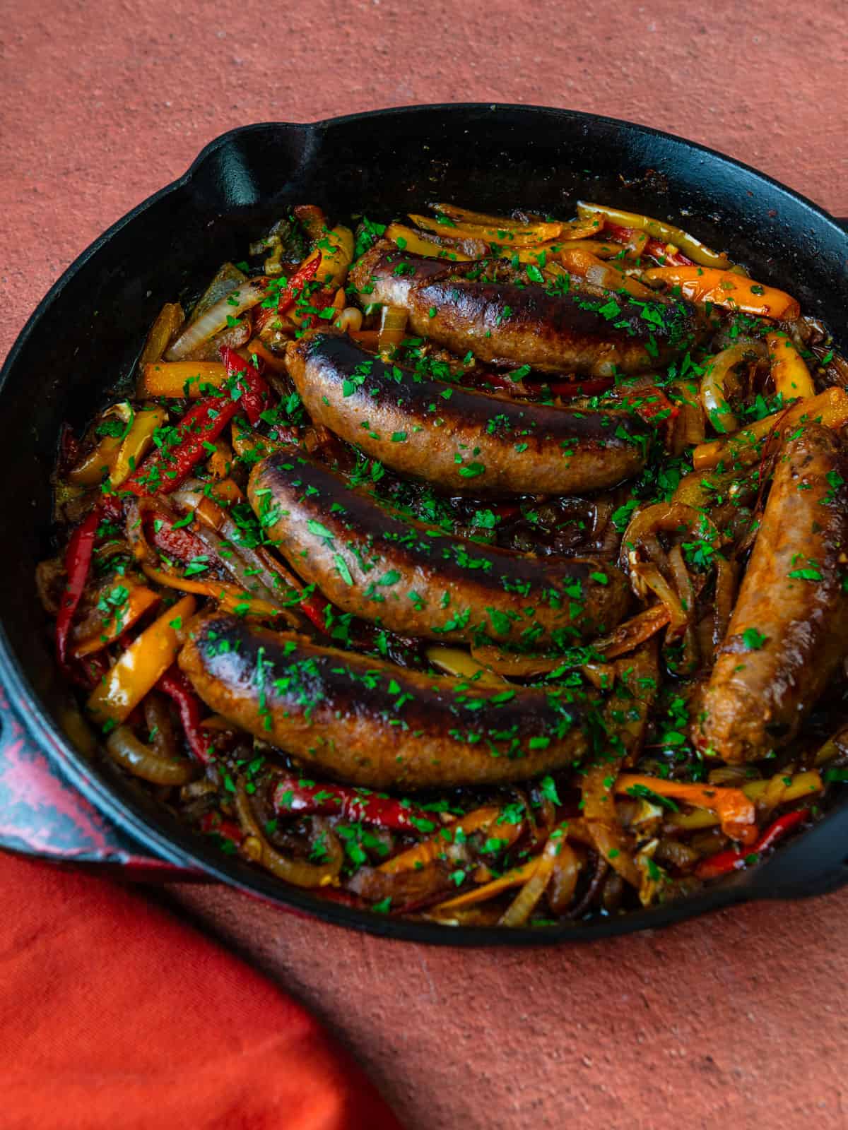 One skillet sausage and peppers with onions.