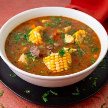 Argentinian beef stew with corn and potatoes.