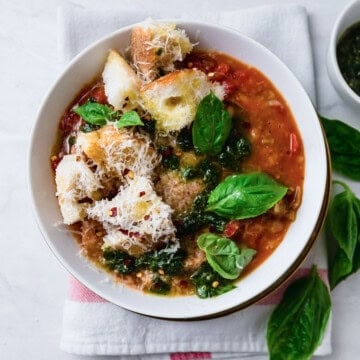 Tuscan bread soup aka ribollita is an Italian tomato soup with beans and thickened with bread.