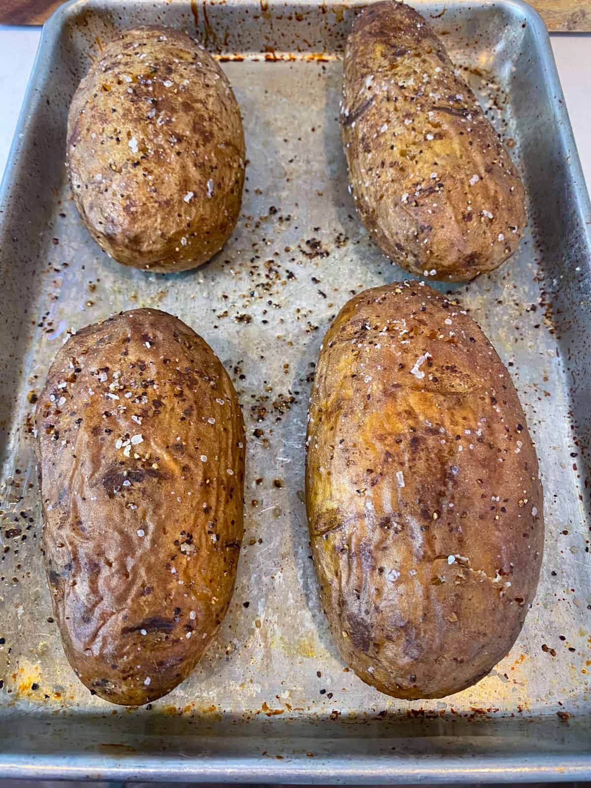 Bake the russet potatoes until completely cooked through.