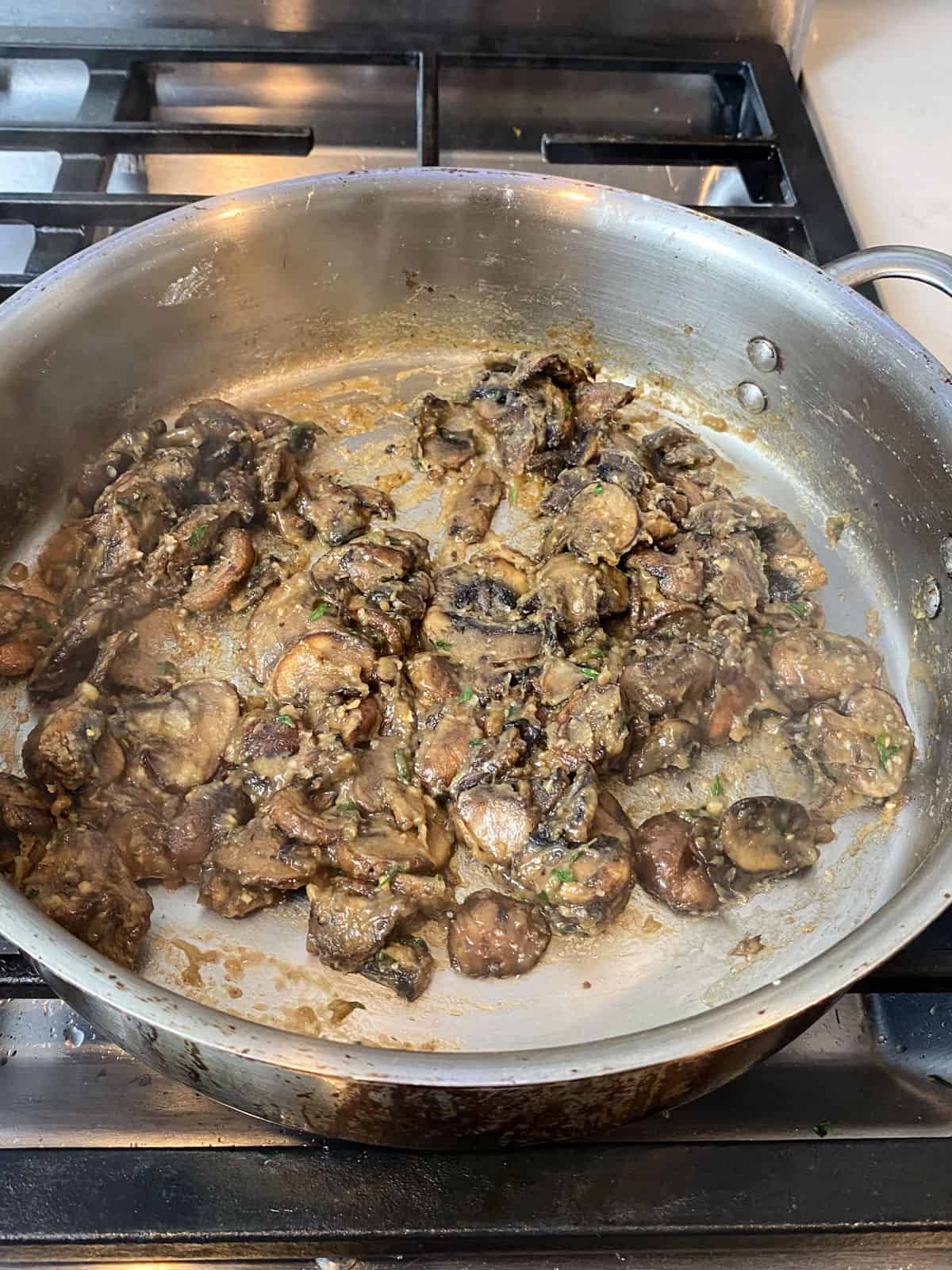 Cook the flour with the sautéed mushrooms until all of the raw flour is cooked and the mixture has thickened.