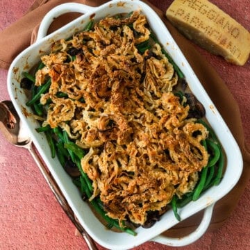 Green bean casserole recipe topped with fried onions.