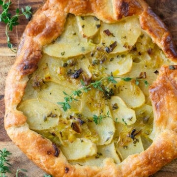 Savory leek and potato tart with fresh thyme.