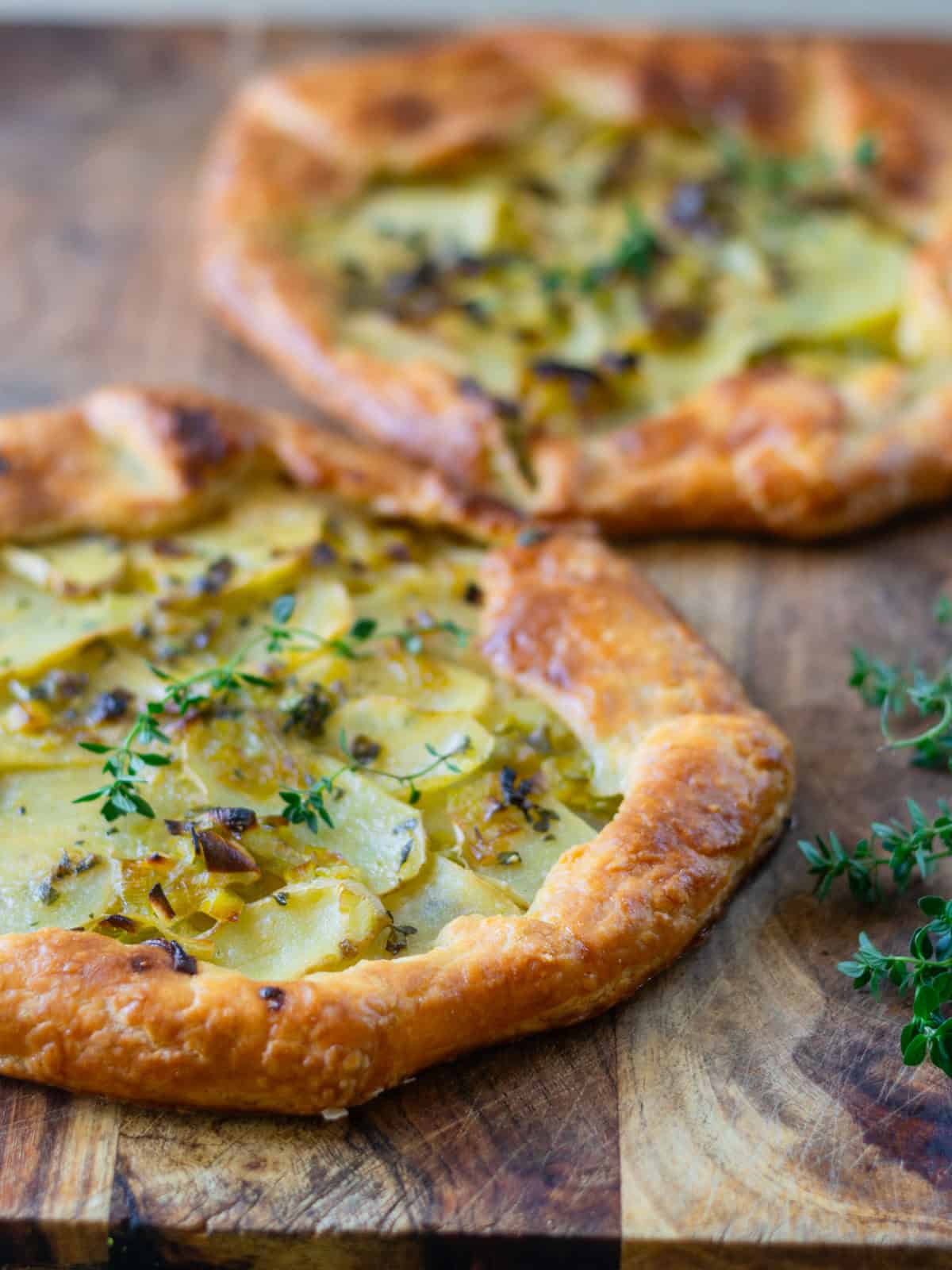 Potato leek galette with sautéed leeks and fresh thyme.