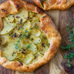 Potato leek tart recipe with sautéed leeks and a Dijon bechamel sauce.