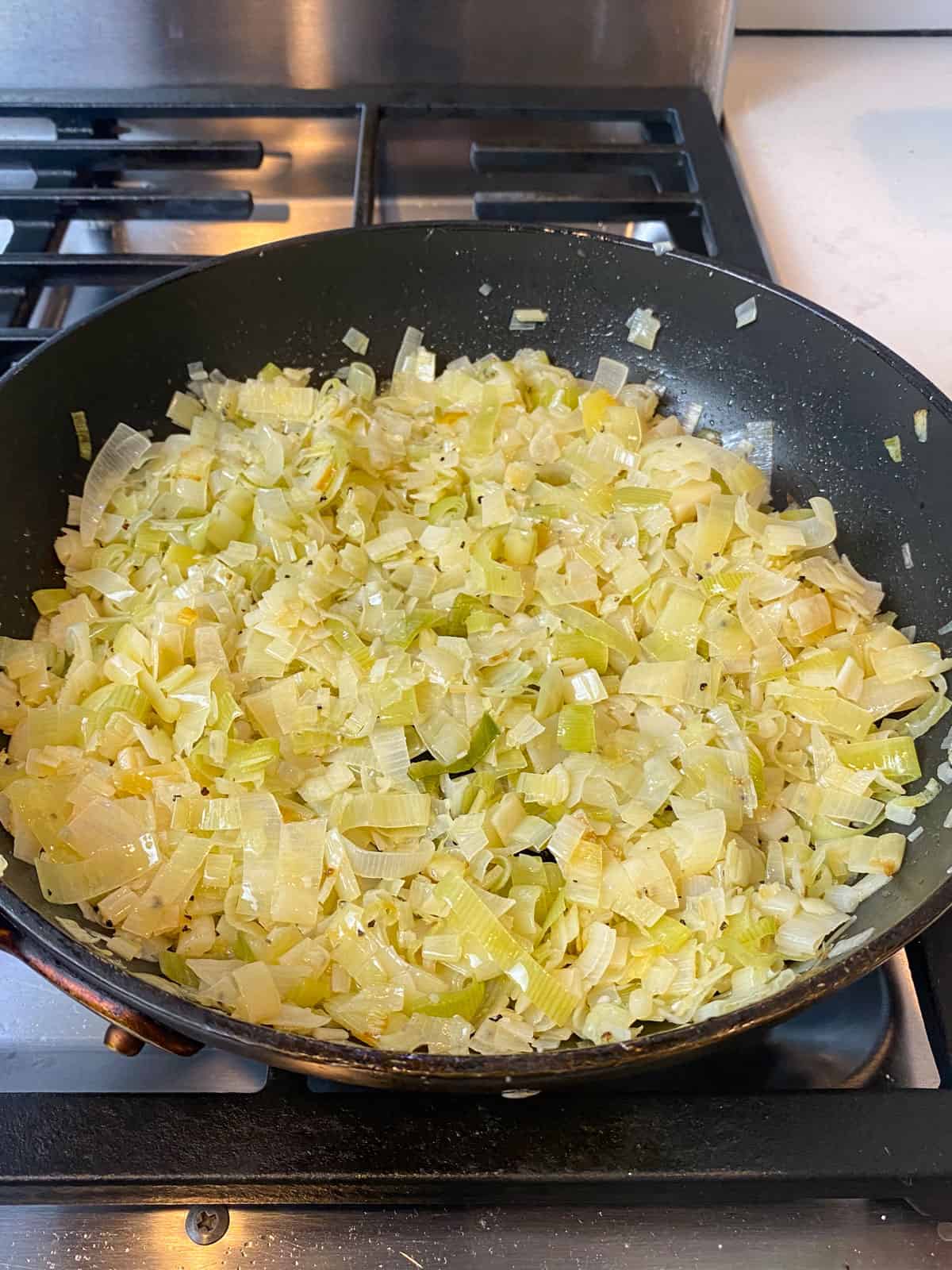 Saute chopped leeks in butter until softened and tender.