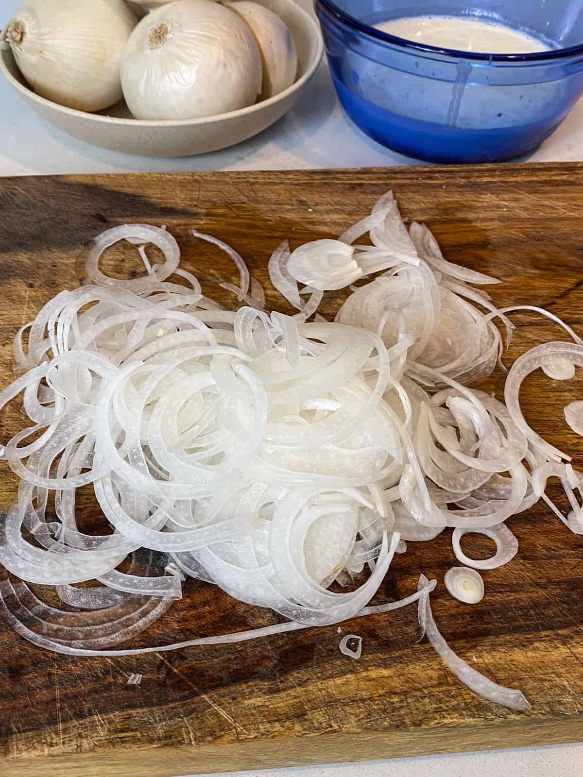 Use a mandolin to slice the onions thin.