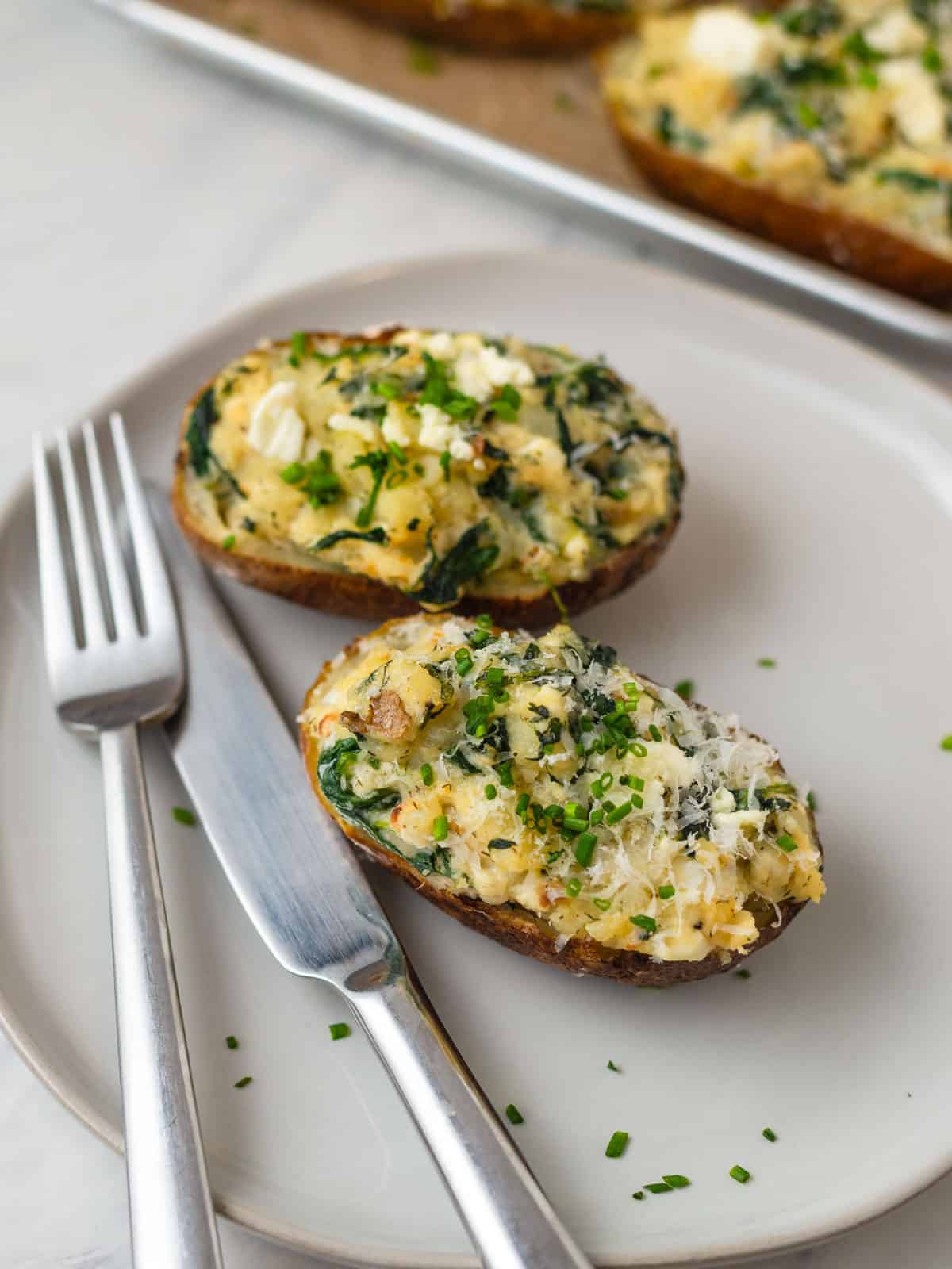 Spanakopita baked potatoes stuffed with spinach and feta cheese.