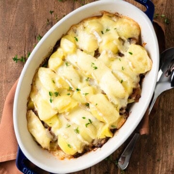 Tartiflette is a French casserole layered with potatoes, cheese and caramelized onions.