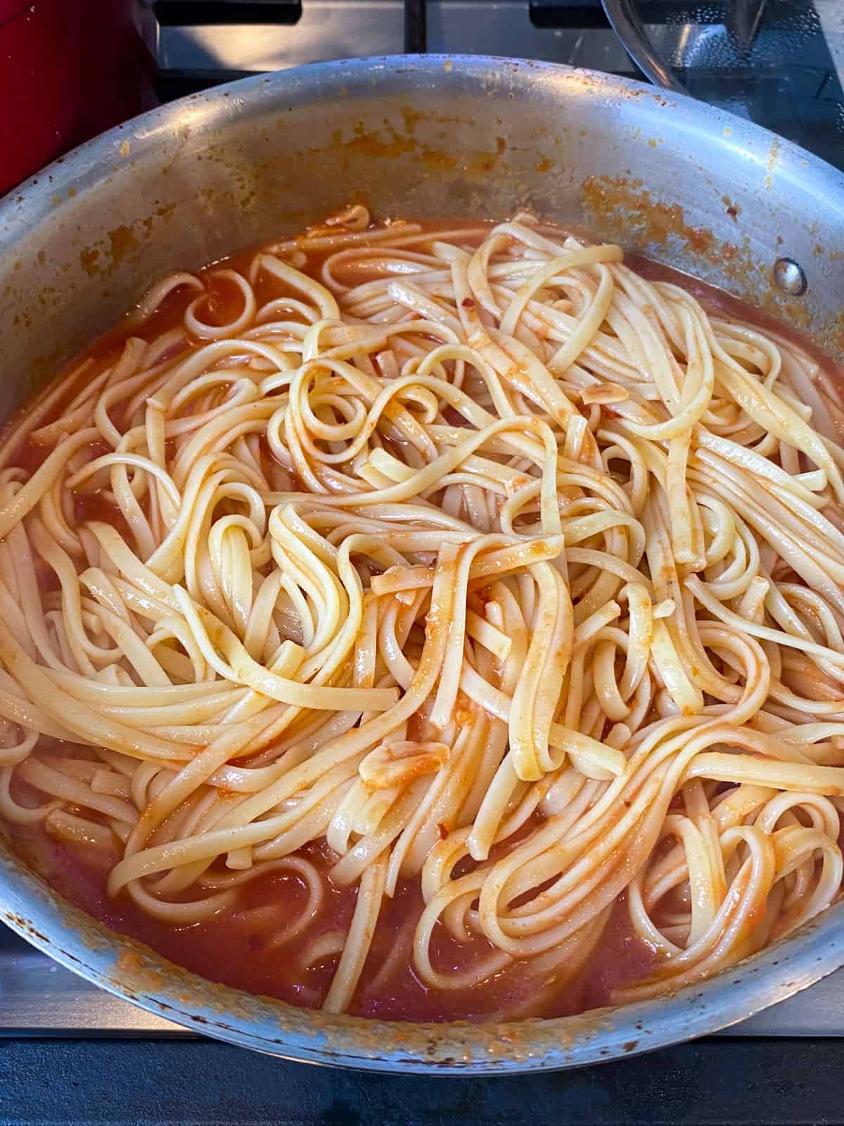 Add the cooked pasta to the sauce and toss together.