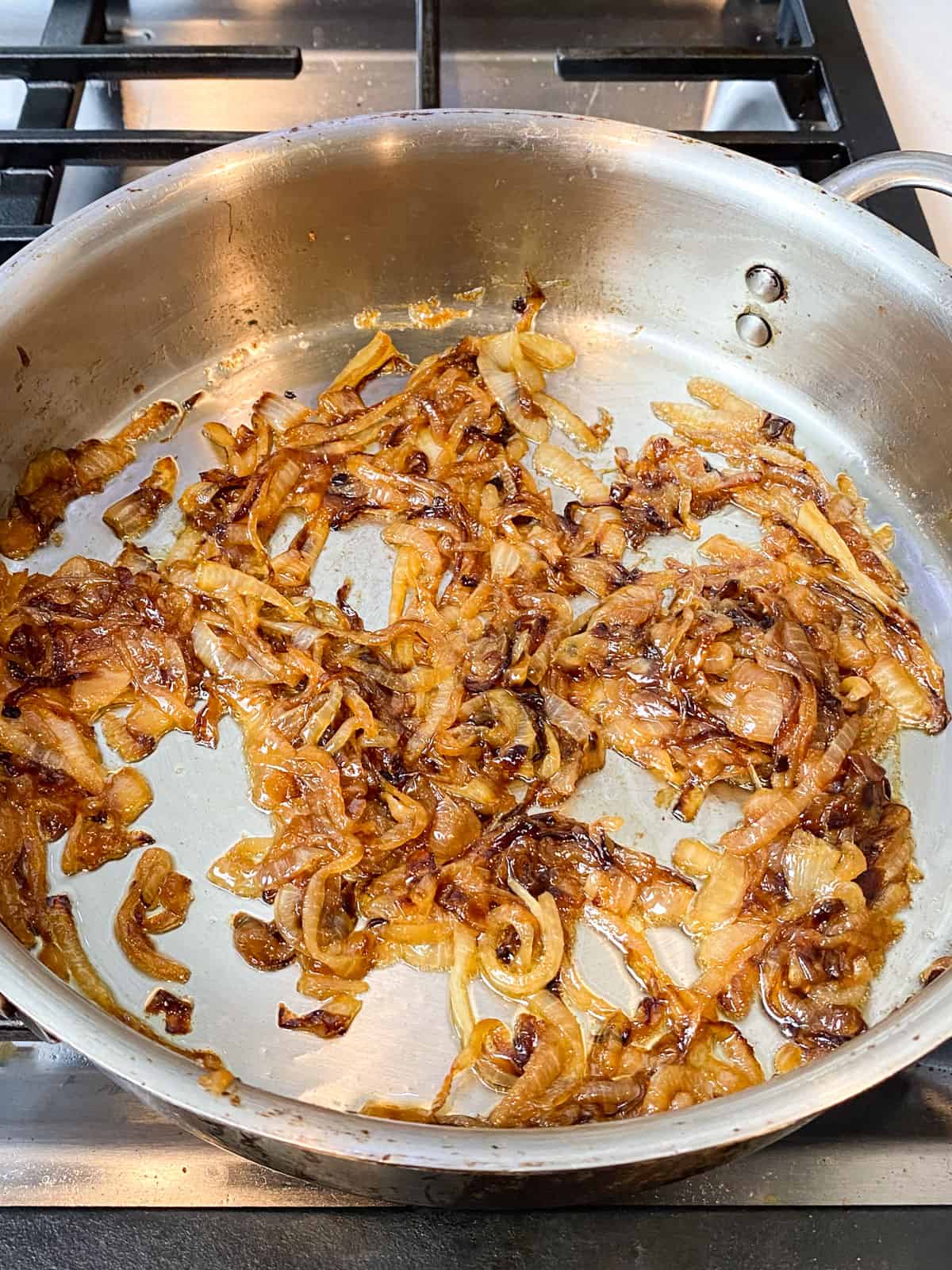 Caramelize the onions until they are deeply golden brown and sweet.