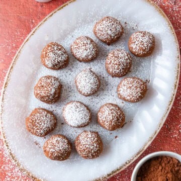 Easy no bake tiramisu truffle recipe with espresso and cocoa powder.