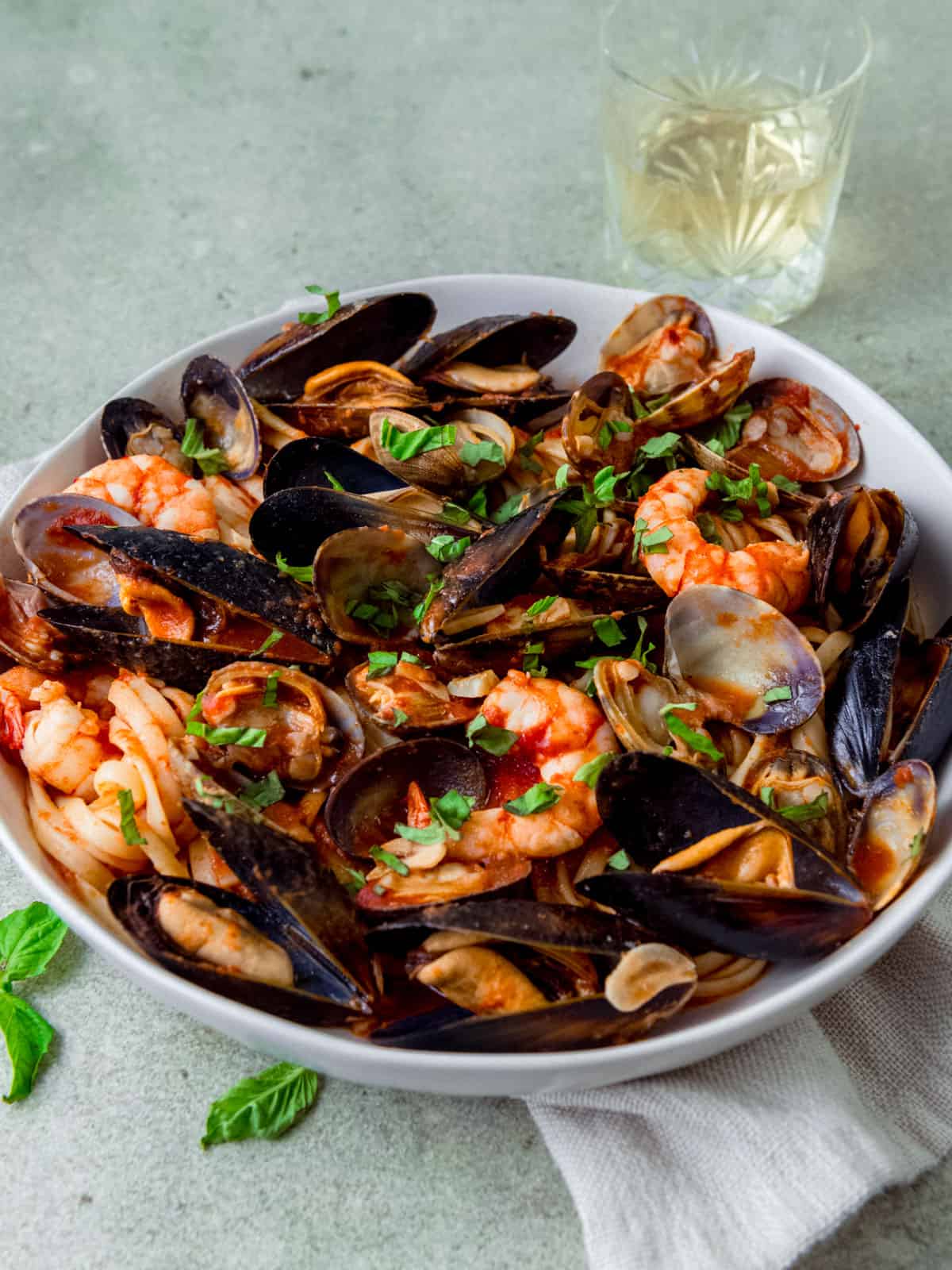 Seafood pasta with mussels, clams in a light tomato sauce.