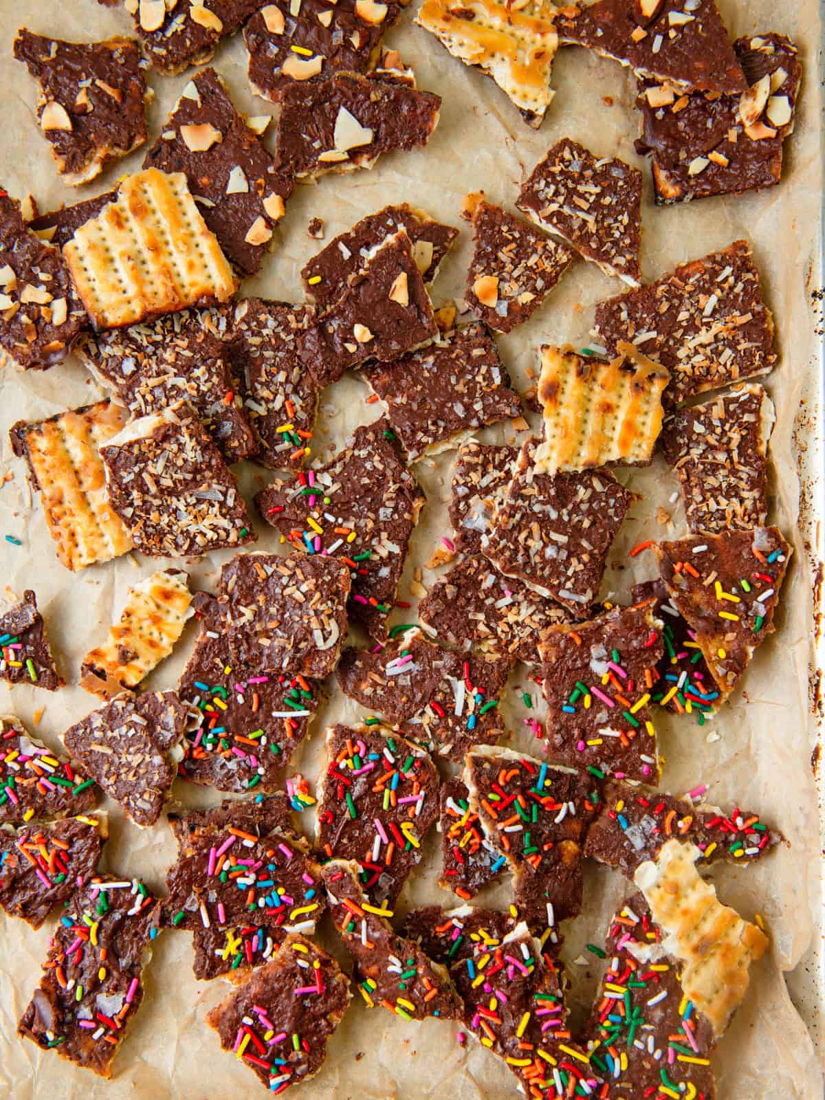 Matzo toffee recipe with chocolate, sea salt and topped with toasted coconut and almonds.