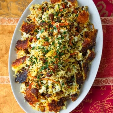 Colorful jeweled rice with saffron and dried fruit and nuts.