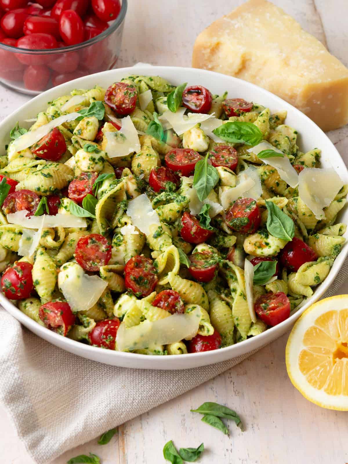Caprese pasta salad is what summers are made for! With cherry tomatoes, mozzarella and a fresh basil pesto.