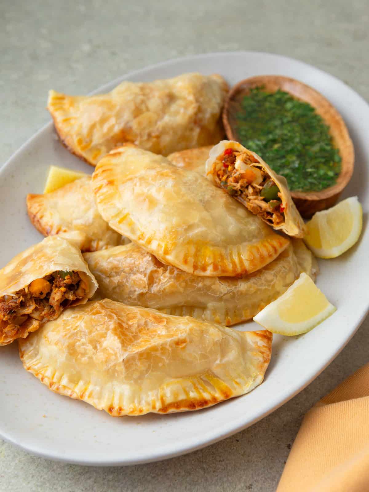 Tuna empanadas with sautéed peppers, olives and hard boiled egg.