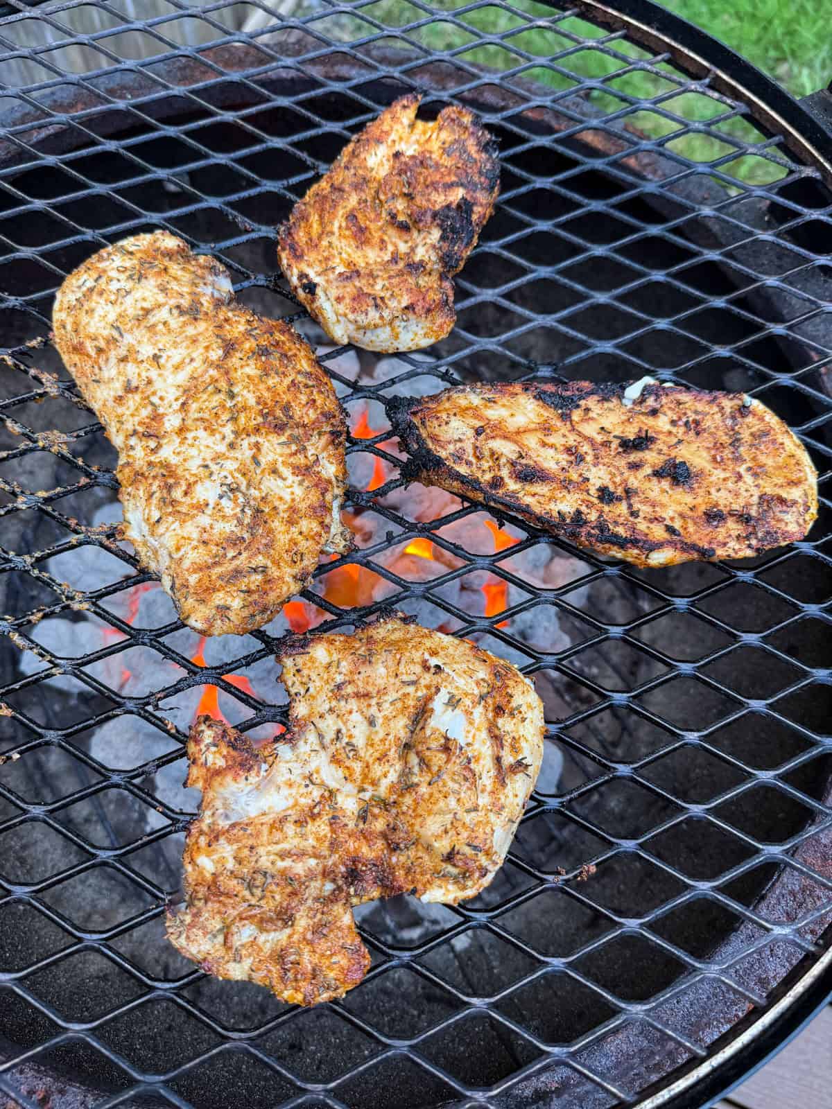 Grill the chicken until charred on both sides and cooked all the way through.