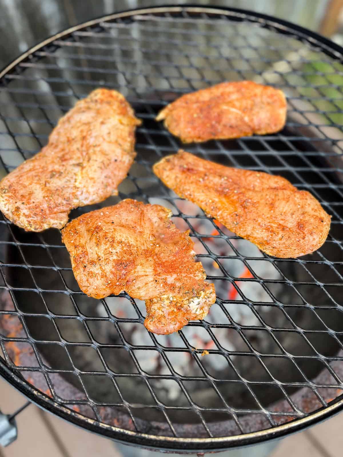 Season the sliced chicken breasts well and place on the grill or grill pan.