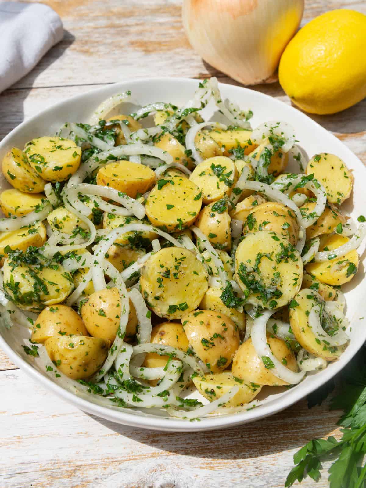 This Lebanese potato salad is full of fresh and citrusy flavors with sumac, fresh herbs and lemon.