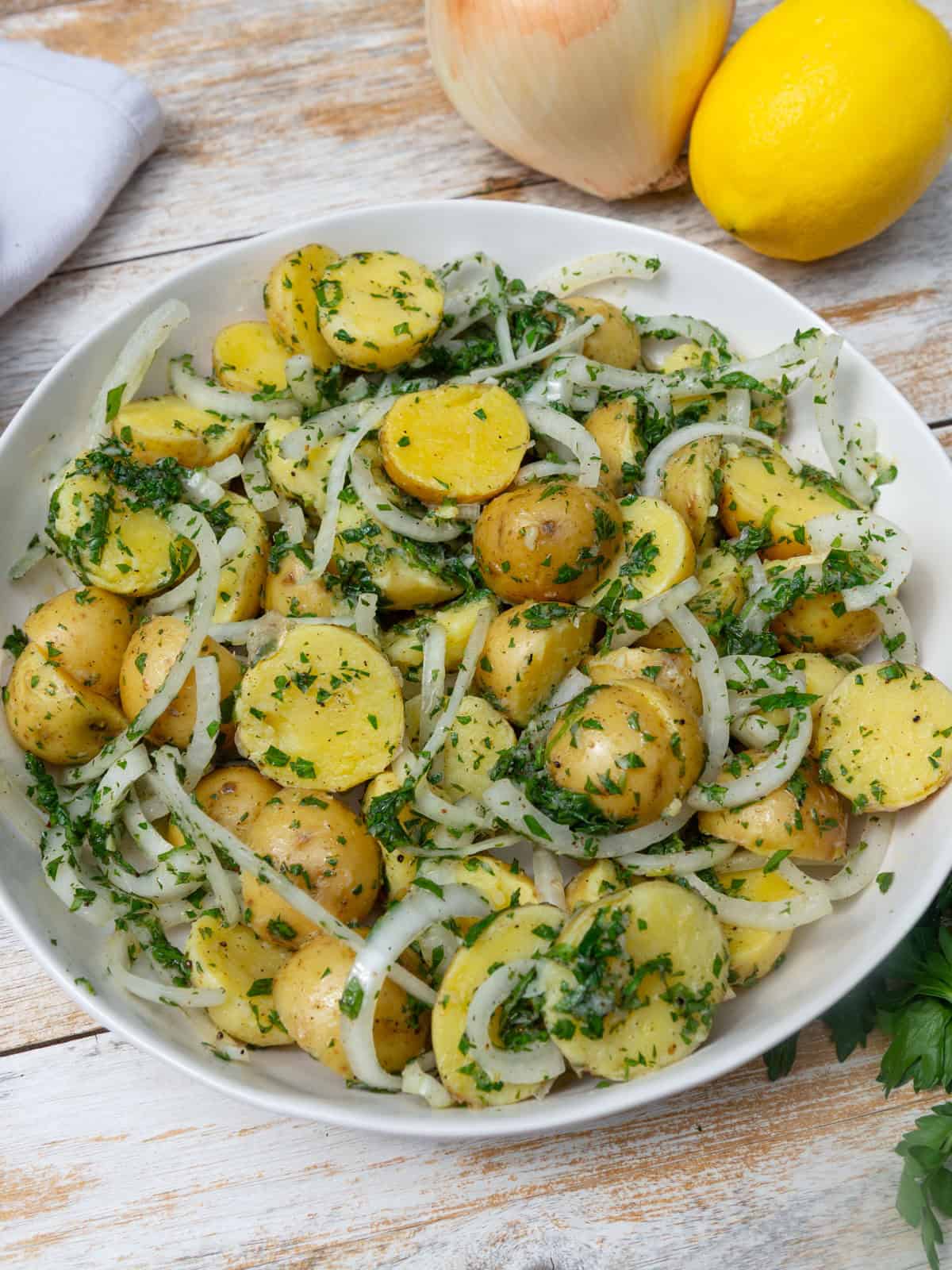Lebanese potato salad with sumac and a fresh lemon herb dressing.