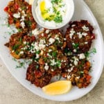 Greek tomato fritters are savory pancakes that are full of sweet tomatoes, fresh mint, dill and creamy feta cheese.