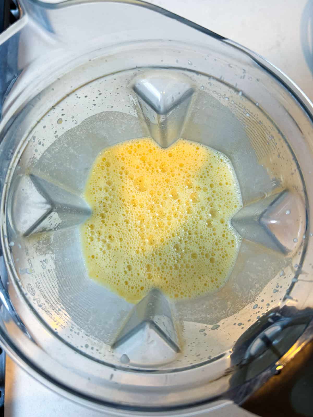 Blend the clafoutis batter in a blender until well combined and frothy.