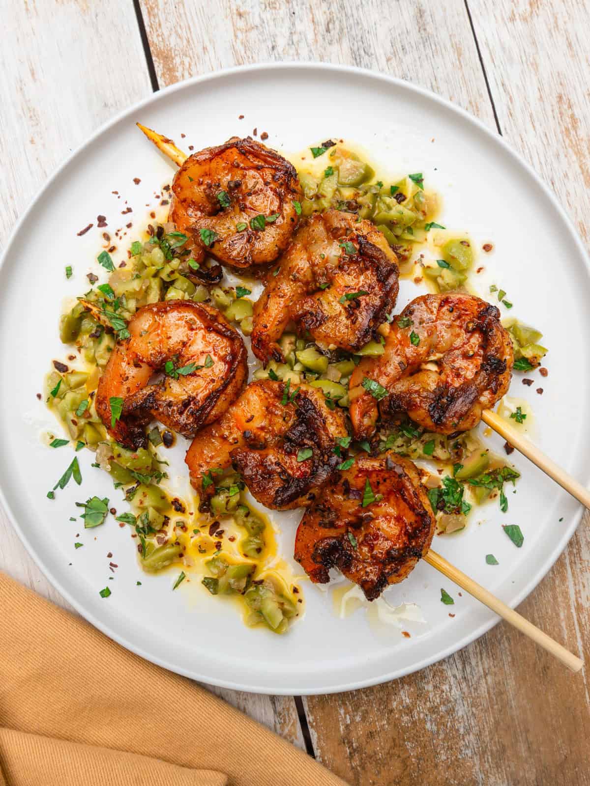 Shrimp kabobs with preserved lemon and olives.
