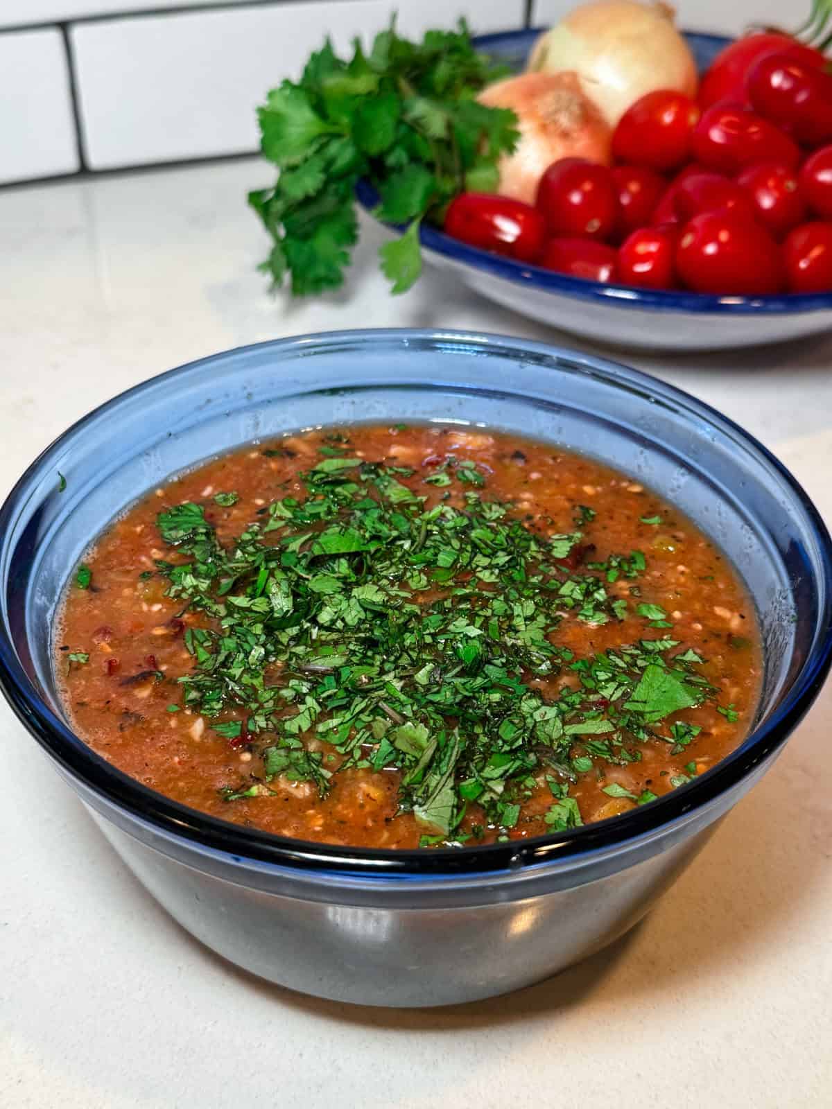Add chopped cilantro to the charred salsa and stir to combine.