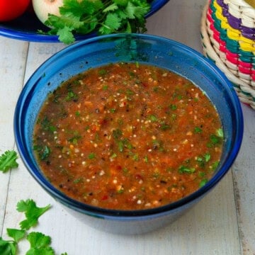 Charred tomato salasa with tomatillo, garlic and cilantro.