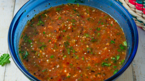 Charred tomato salasa with tomatillo, garlic and cilantro.