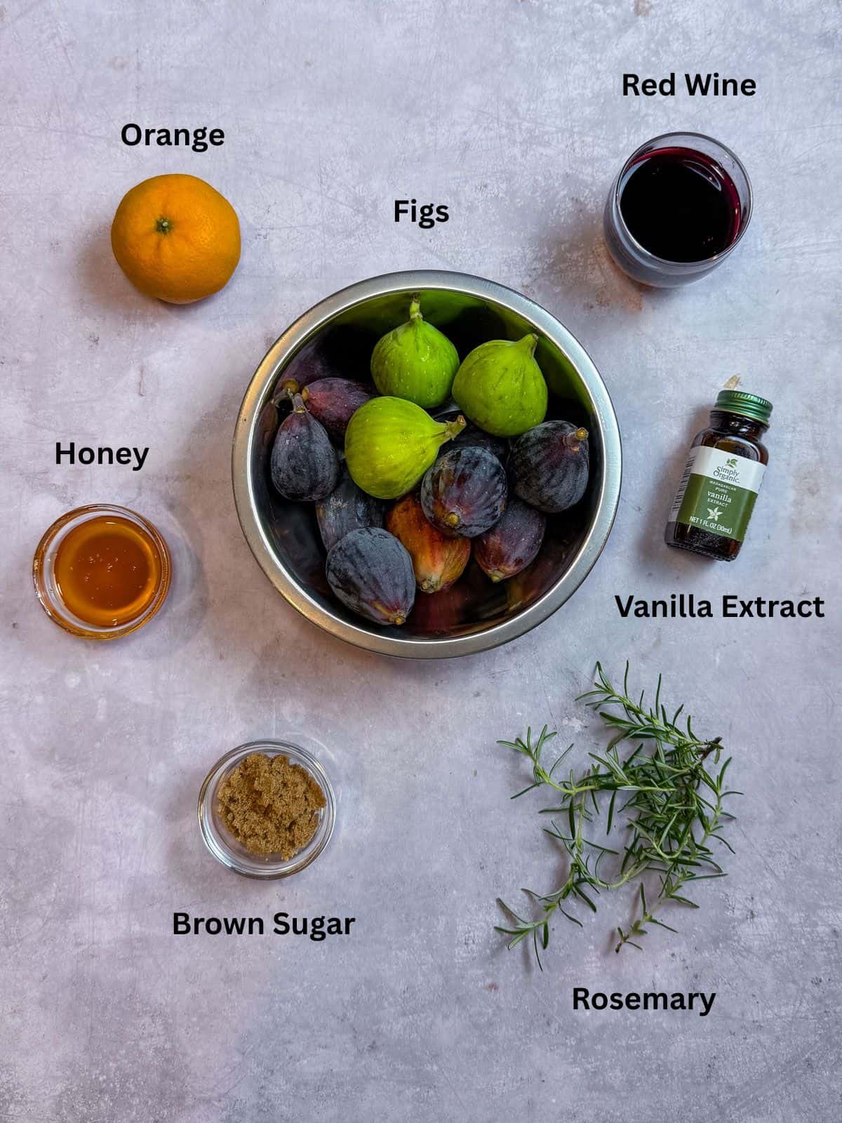 Ingredients for red wine roasted figs with rosemary, honey, vanilla and brown sugar.