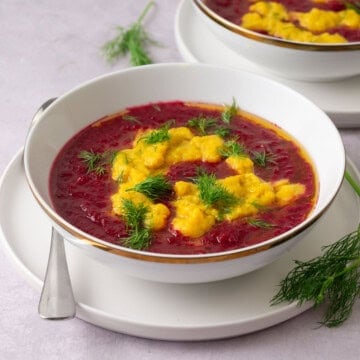 Red and yellow beet soup with fresh dill.