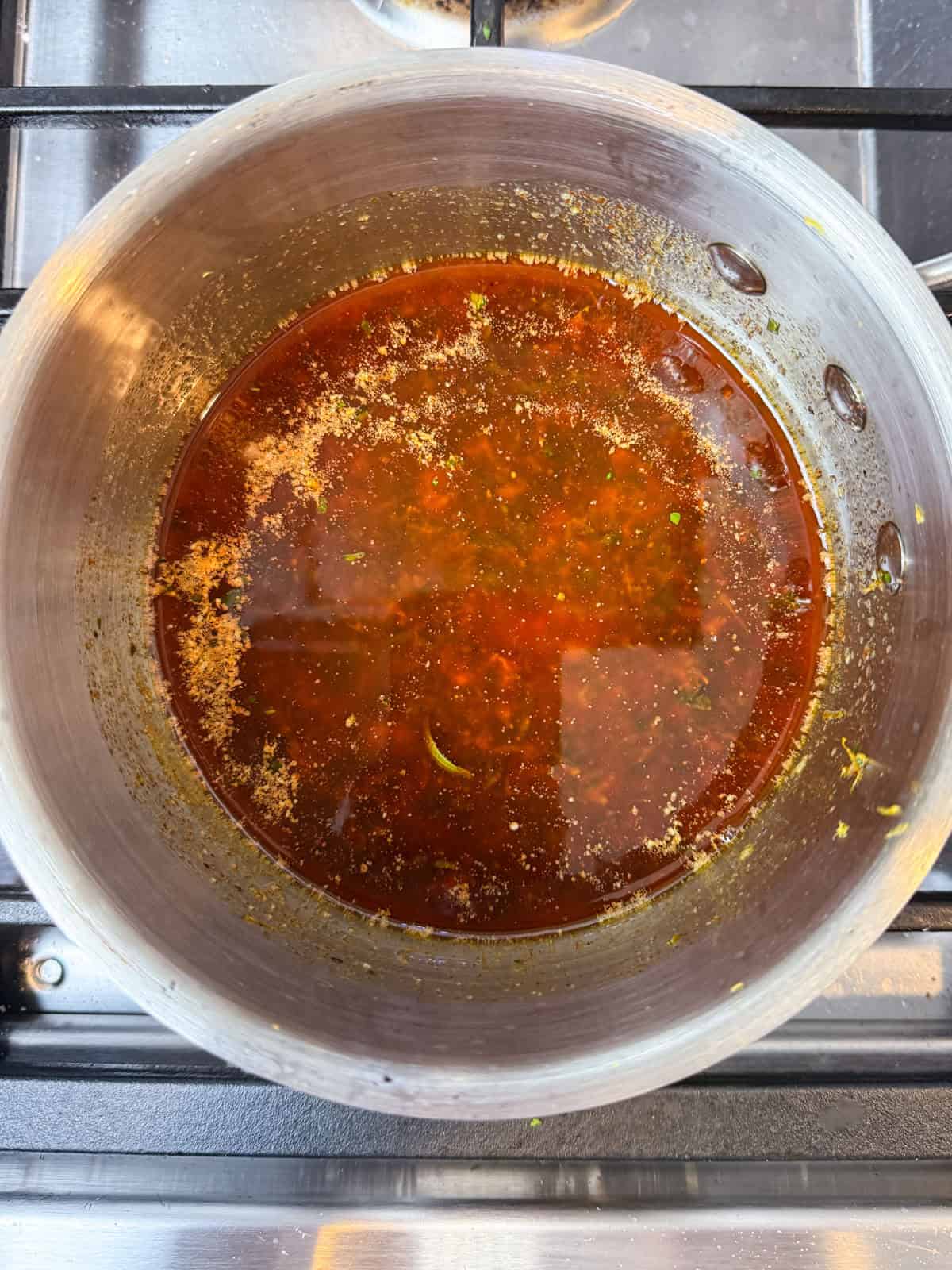 Melt the butter with chopped garlic, paprika and herbs.