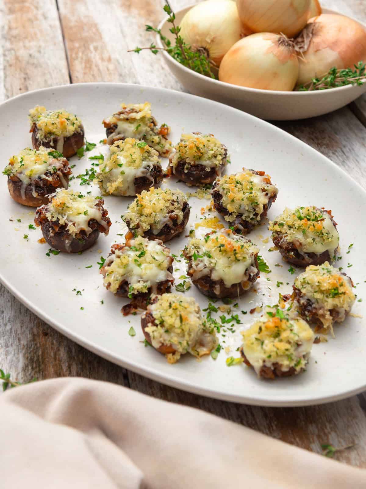 French onion stuffed mushrooms with Gruyère and Parmesan cheese and crispy panko topping.