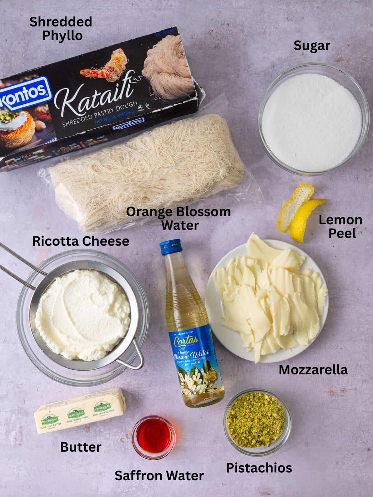 Ingredients for kanafeh, including shredded phyllo, ricotta cheese, saffron and orange blossom water.