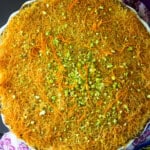 Kanafe is shredded phyllo with melty cheese in the center and soaked in simple syrup.