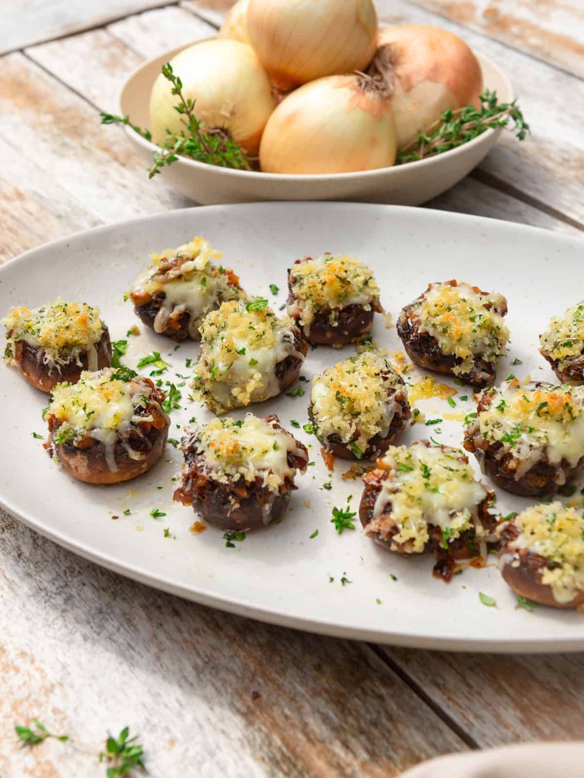 Stuffed mushrooms with caramelized onions, gruyere cheese and an herby panko topping.