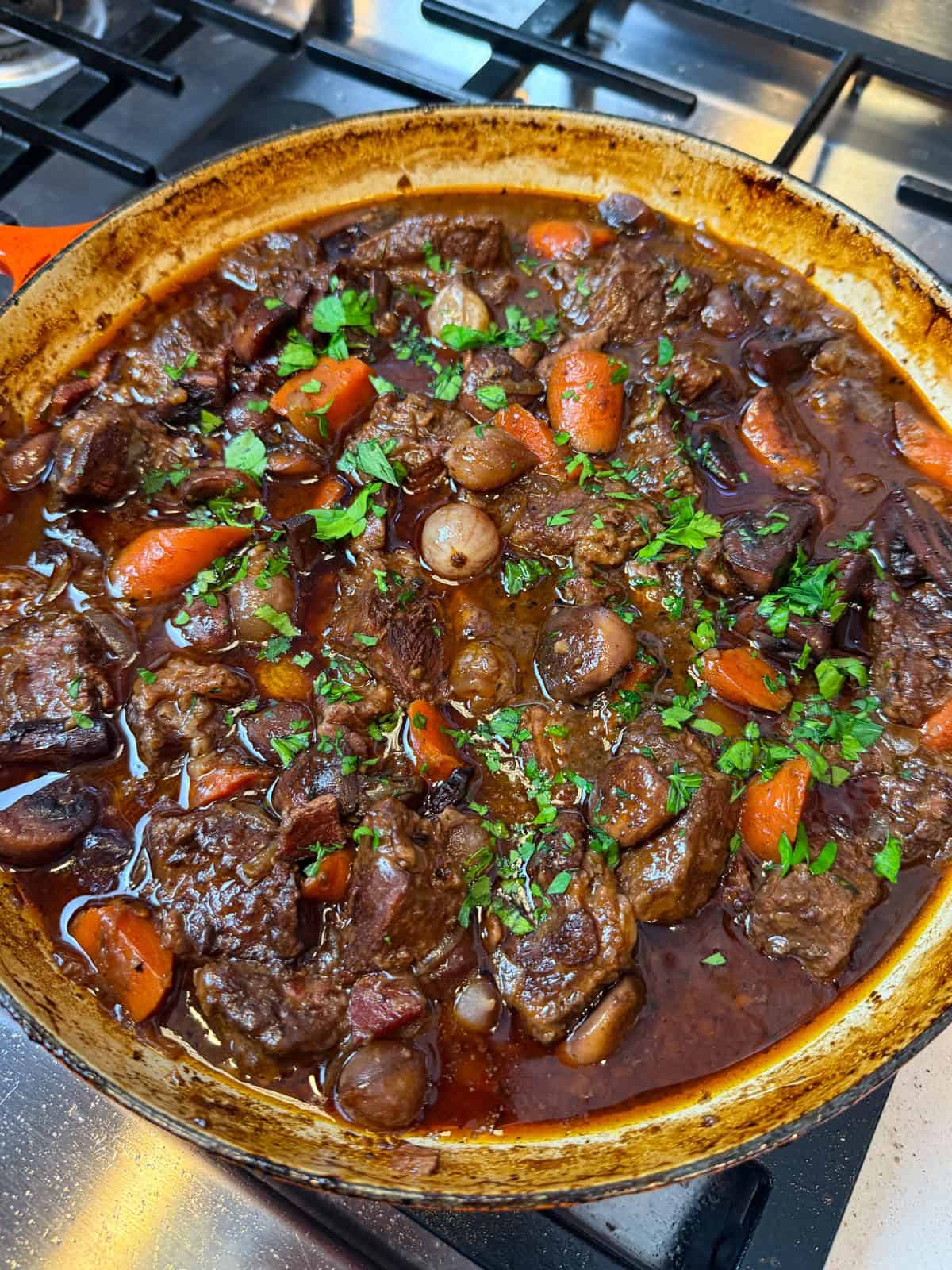 Stir the mushrooms and onions into the stew. Toss gently to combine and let everything simmer together for a few minutes.