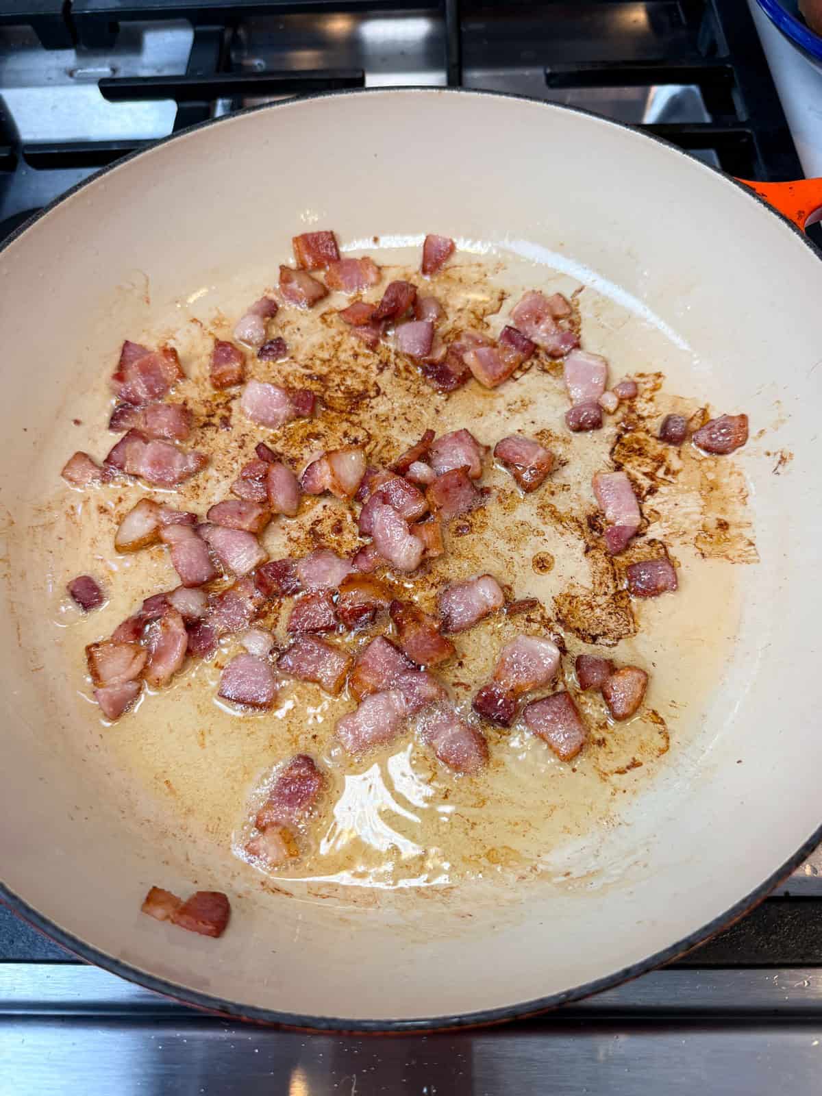 Render the bacon until some pieces are crisp and the fat has melted. That flavorful fat becomes the base for searing the beef.