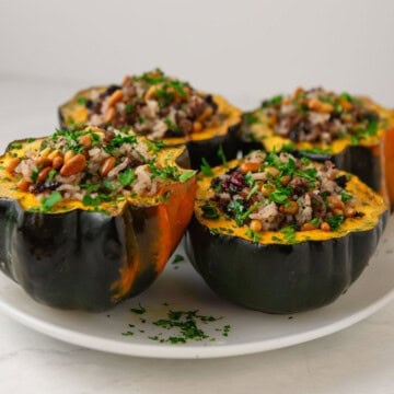 Roasted acorn squash stuffed with spiced rice and ground beef.