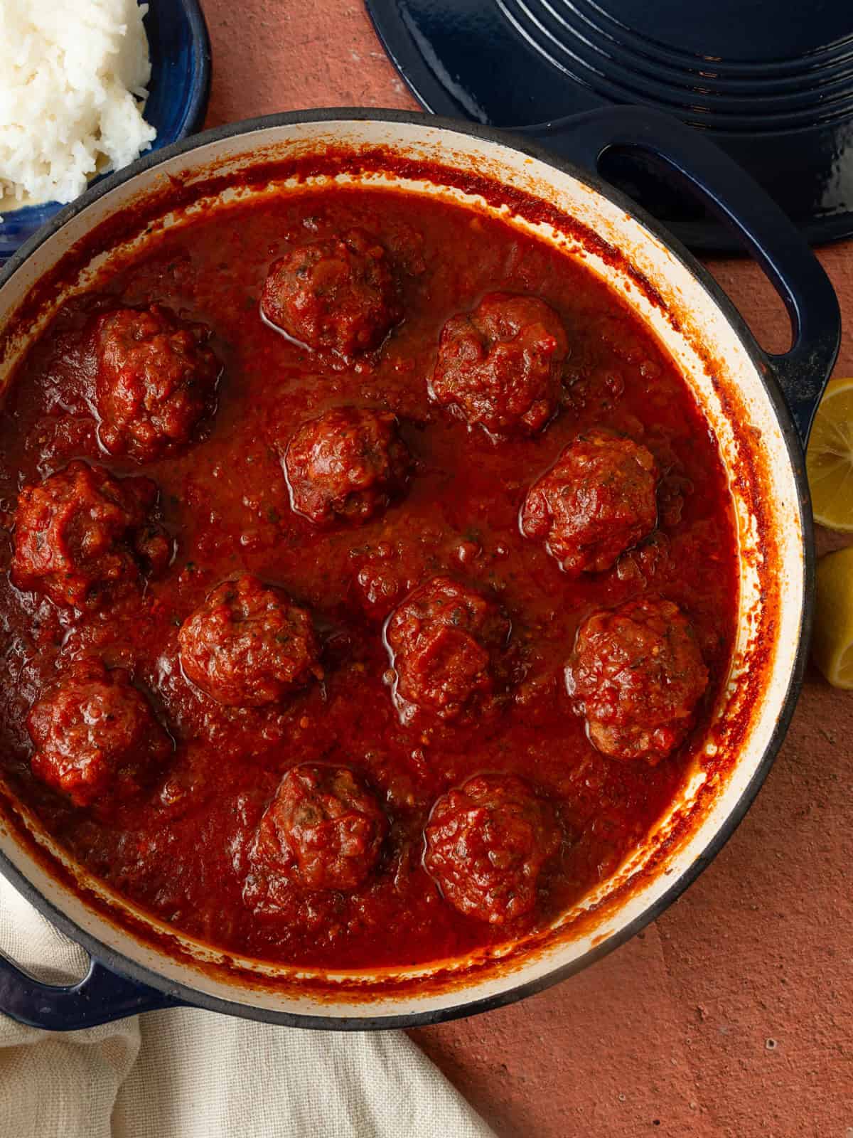 These Jewish style sweet and sour meatballs have tender beef meatballs simmered in a tangy and slightly sweet tomato sauce.