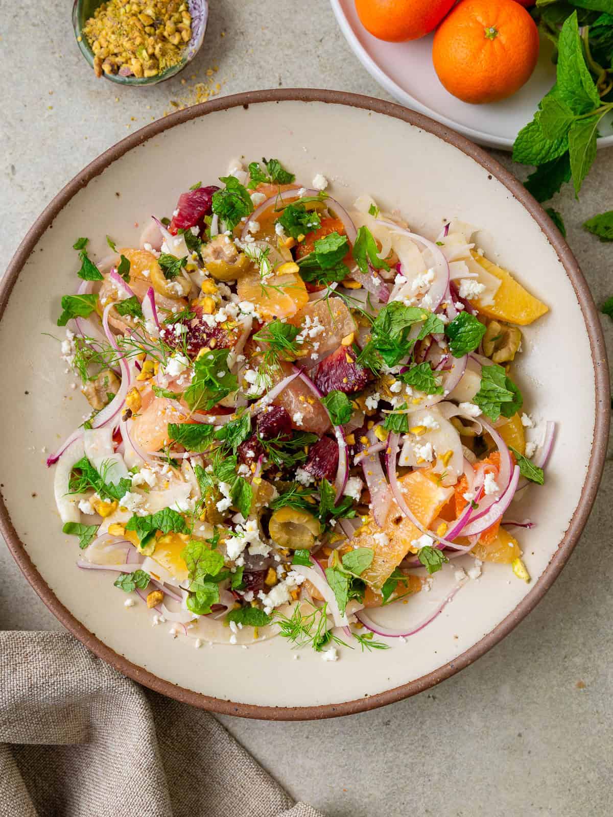 Citrus fennel salad with olives, chopped pistachios and fresh mint.