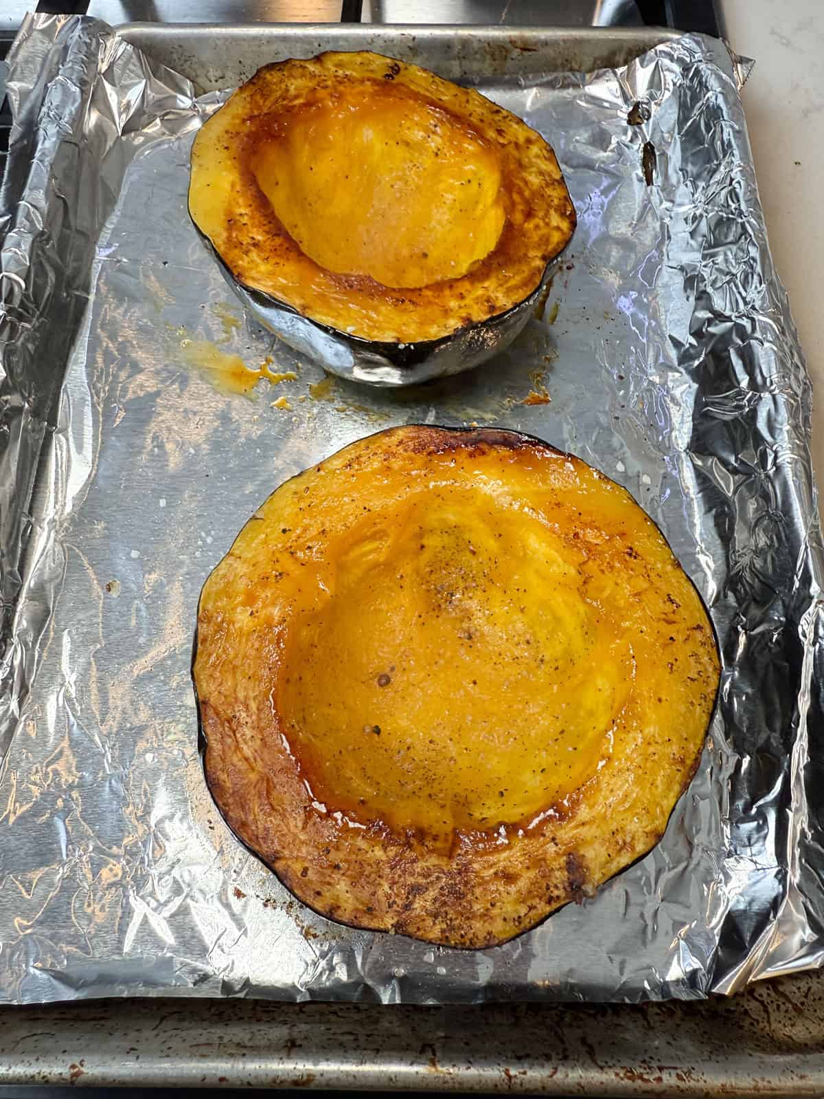 Roast the acorn squash halves until tender.