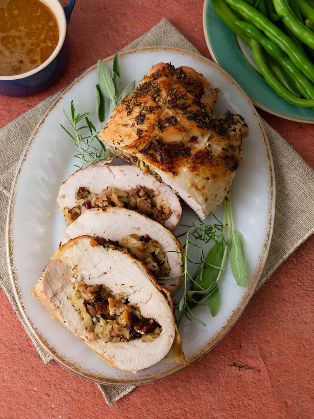 Rolled turkey breast stuffed with sausage and cranberry stuffing and roasted until golden brown.