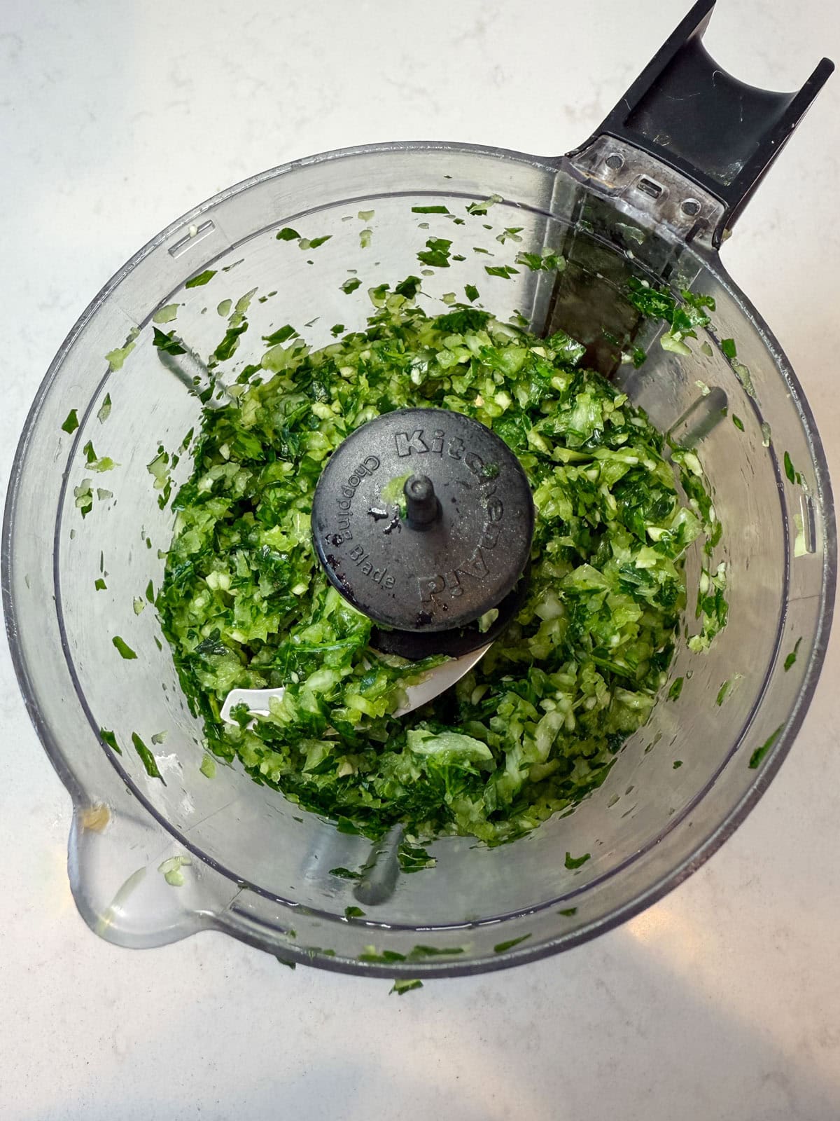 Use a food processor to finely chop onion, garlic and herbs before adding to the ground beef.