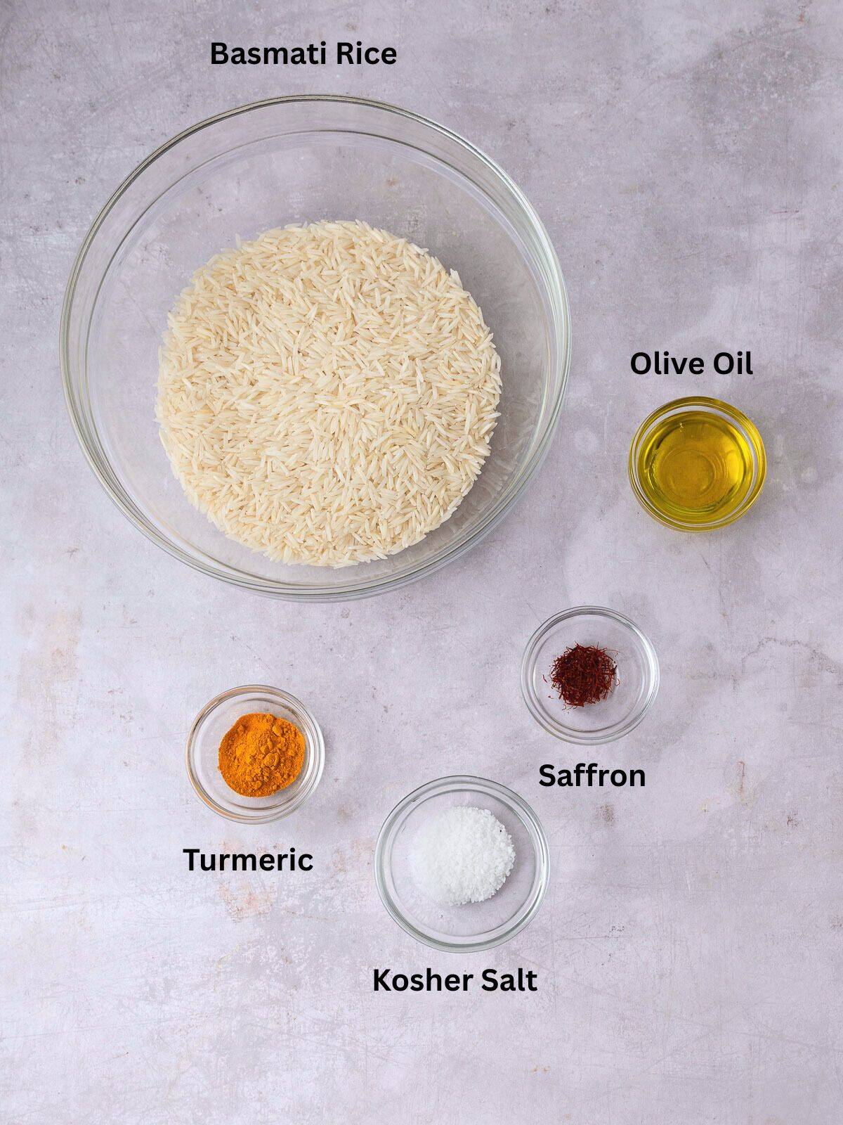 Ingredients for Tahdig, including basmati rice, olive oil, turmeric, saffron and salt.